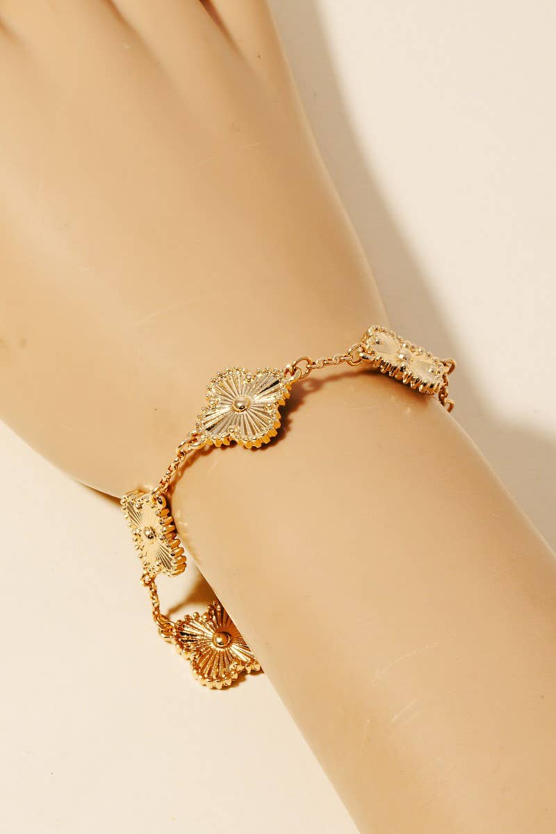 intricate gold clover chain link bracelet