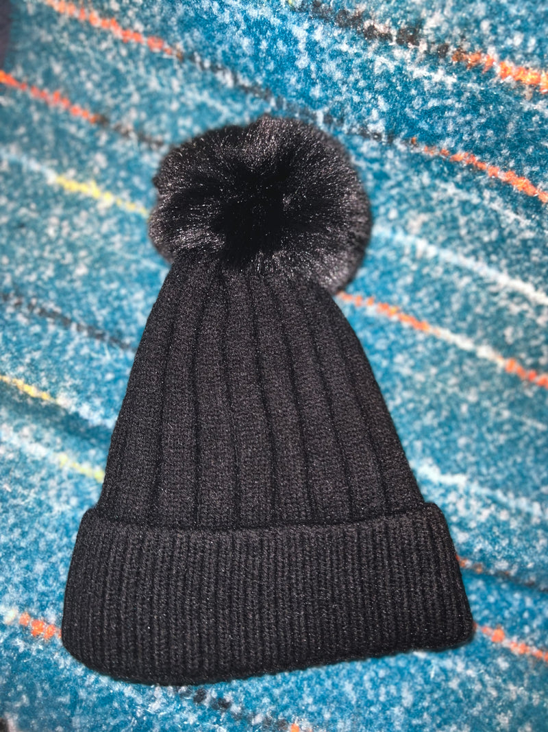 black knit pom pom beanie